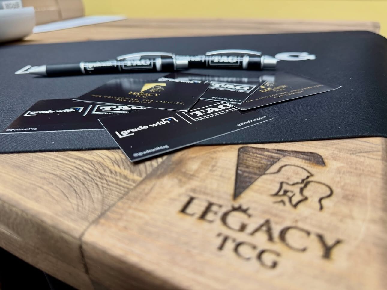 Legacy TCG branded packaging on the counter
